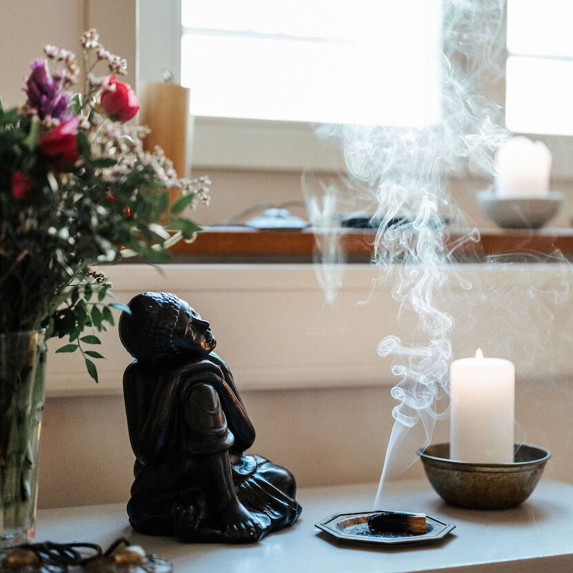 Buddha und Kerze Philosophie